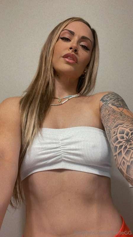Lifting my tube top up more for a better view when I reach m..