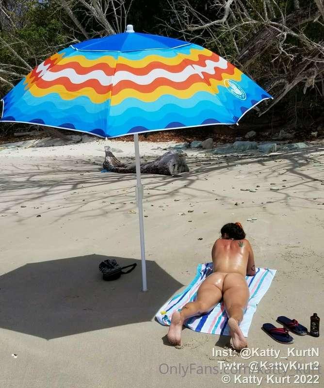 Nude beach, and I need you to oil me up Sir!