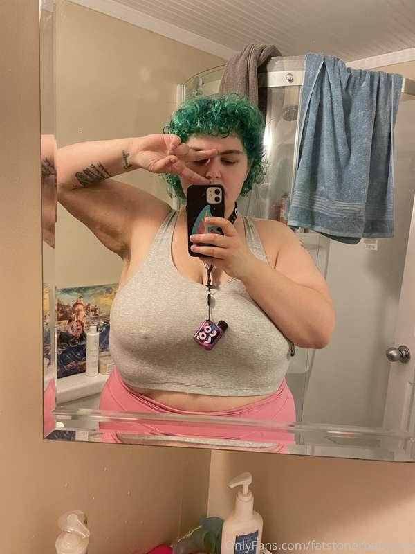 green hair. pierced nipples.