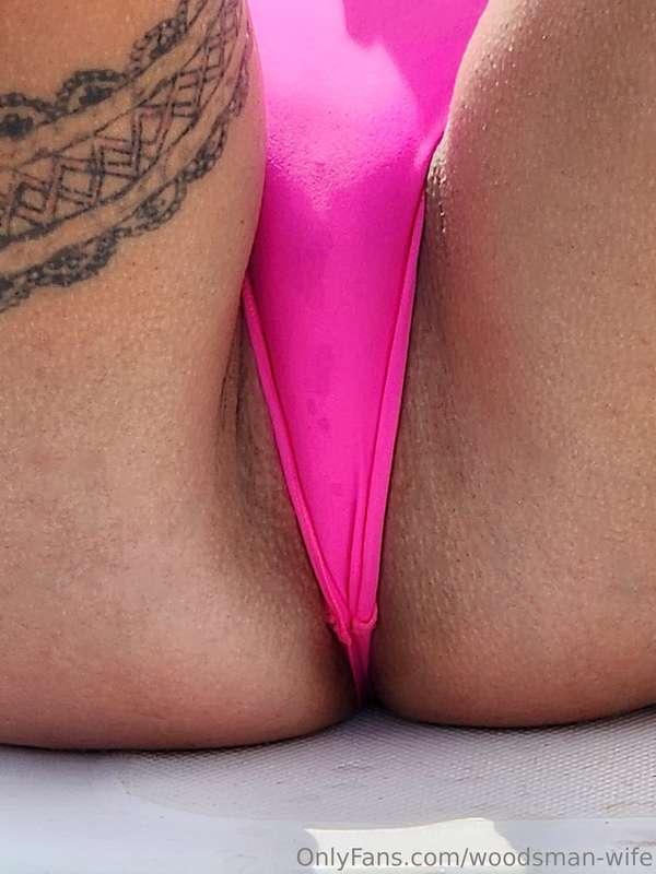 Pink pussy under a pink bikini.