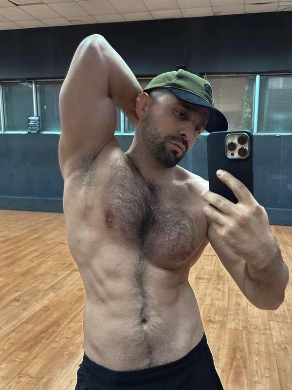 Hairy chest play 🐻 #bear #shredded #handsome #pits #strong #fitguy #gym