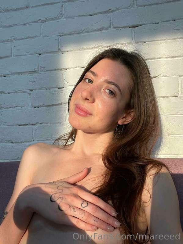 In this photo, I'm enjoying the gentle rays of the sun playi..