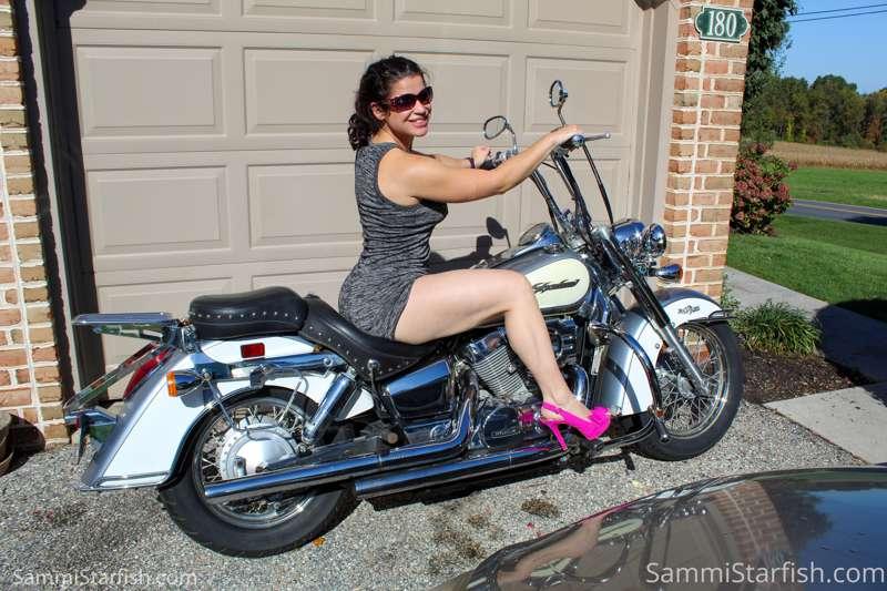 20 pic set
Pink heels, minidress, and a motorcycle.  A winni..