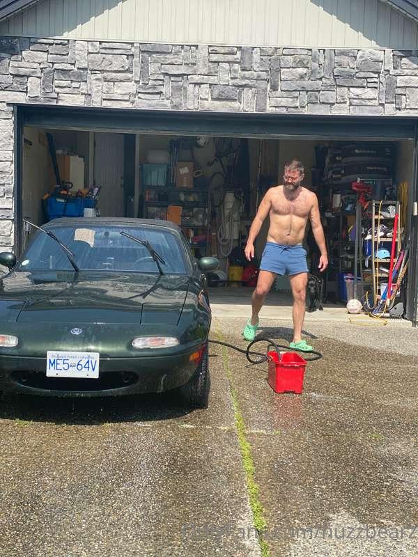 Just a suburban dad cleaning the car and letting it all hang..