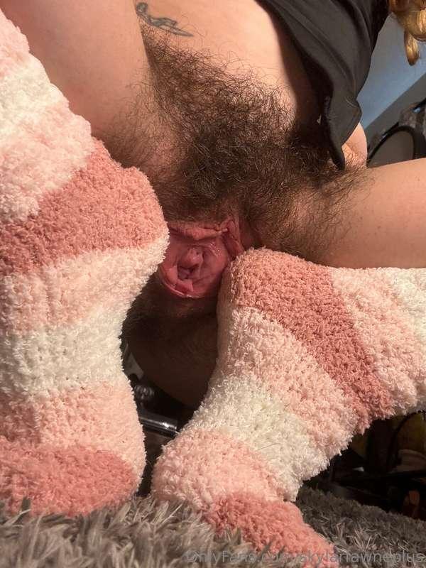 Spreading my hairy pussy wide, using the heels of my feet to..