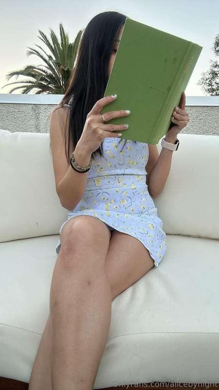 I'm lounging in my backyard, nestled on my cozy sofa, engros..