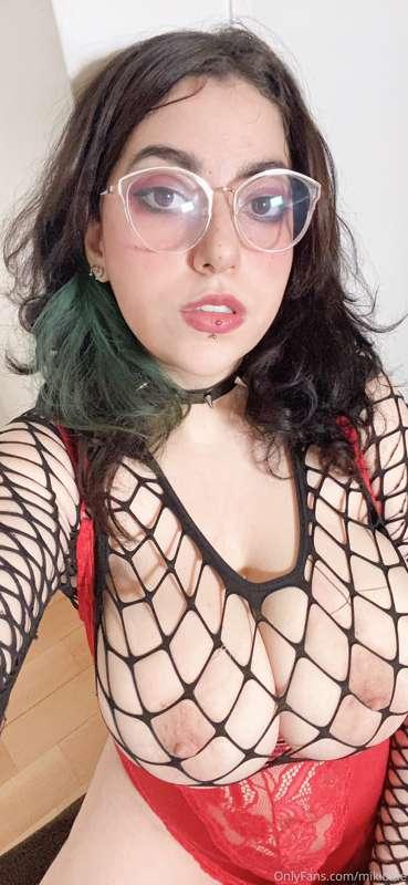 boobs in a red bodysuit AND fishnet top, what more could you..