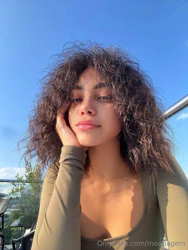 Sitting outside, sunlight warming my face, no makeup, as nat..