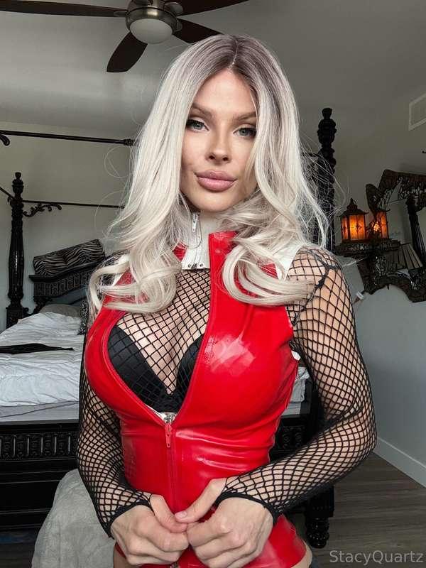 Red latex, black lace and a stare that says "you’re already ..