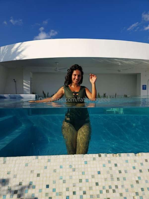 watch my ass shake for you in the infinity pool again and ag..