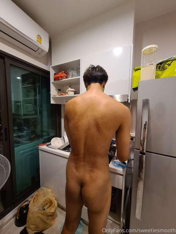 Secretly taking pictures of him cooking
