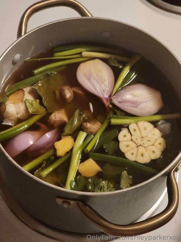 Brewing up a stock to make laksa... there is chicken bones a..