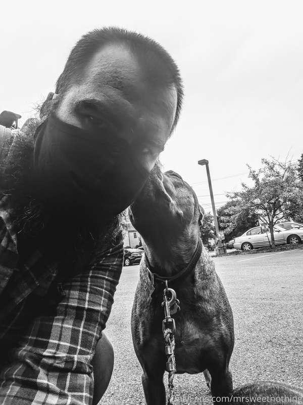 Getting a kiss from Midas as we wait outside the vet.   I'm ..