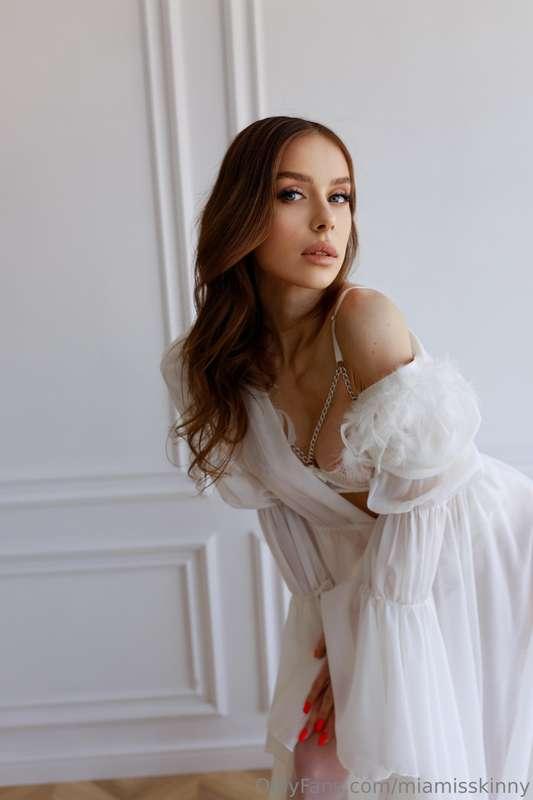 An angelic glow with a devilish spark in her eyes - you shou..