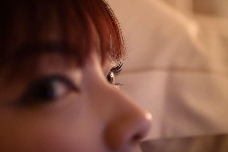 Concentrating on playing mobile phone game...
