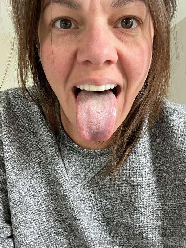 pov tired sick lady hasn’t slept showing off dirty tongue, h..