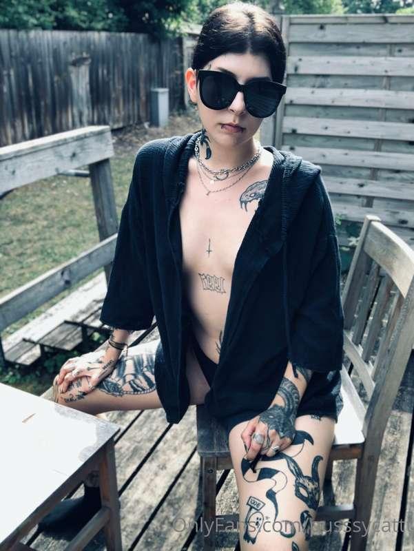 Just sitting in the balcony with only a few pieces of clothi..