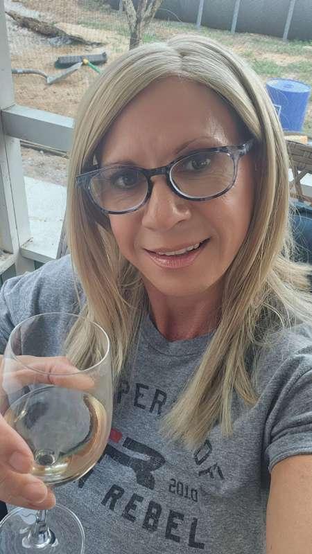 Relaxing and having my birthday drink on my back porch 🍷Hope..