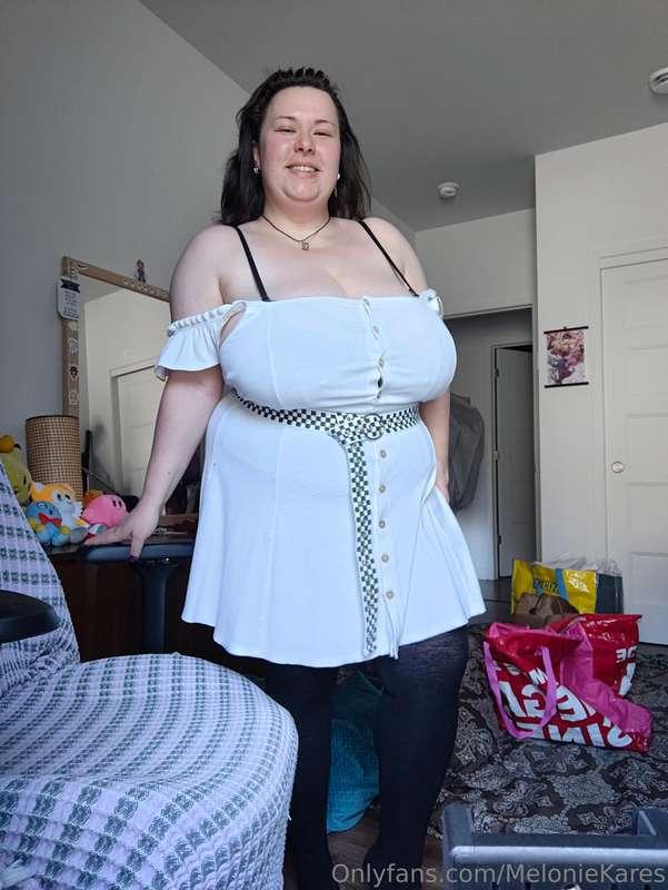 I'm wearing something special underneath this white button u..