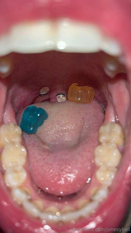 Giantess swallowing gummies and heads. What more could you w..