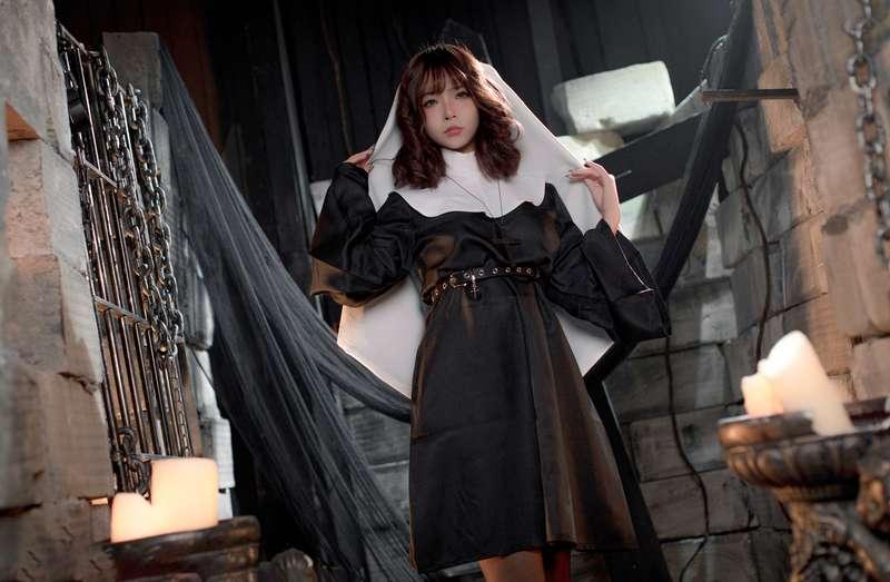 202504 Busty nun in captivity showing her body