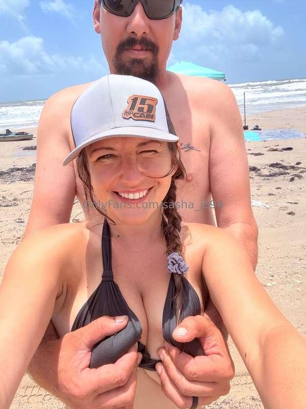 Peek a boob, on the beach, with our friends and kids behind ..