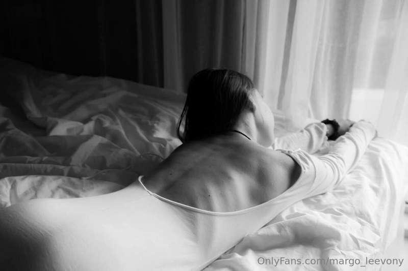 I stretch out on the bed like a cat and I want to arch my ba..