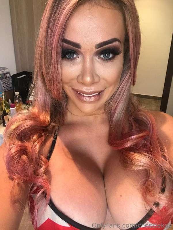 Tan and big fake titties