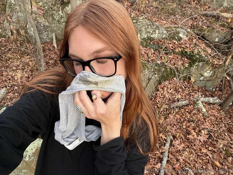 Sniffing my messy panties in the woods 🙈