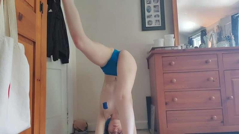 Backbend headstand against the wall 