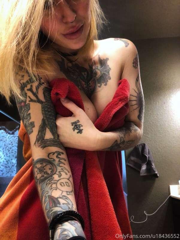 Wearing nothing but a red towel... and even that’s hanging o..