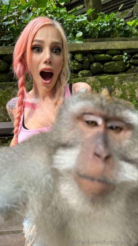 Help me identify this photo bomber