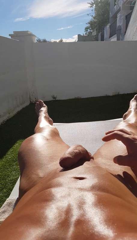 Nude sunbathing in front of the neighbours wanking with nude..