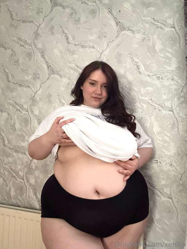 clothes barely holding it in… wanna help? :3