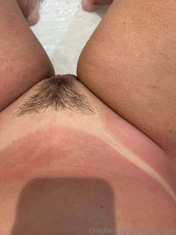 Tan lines and a little bush >>>