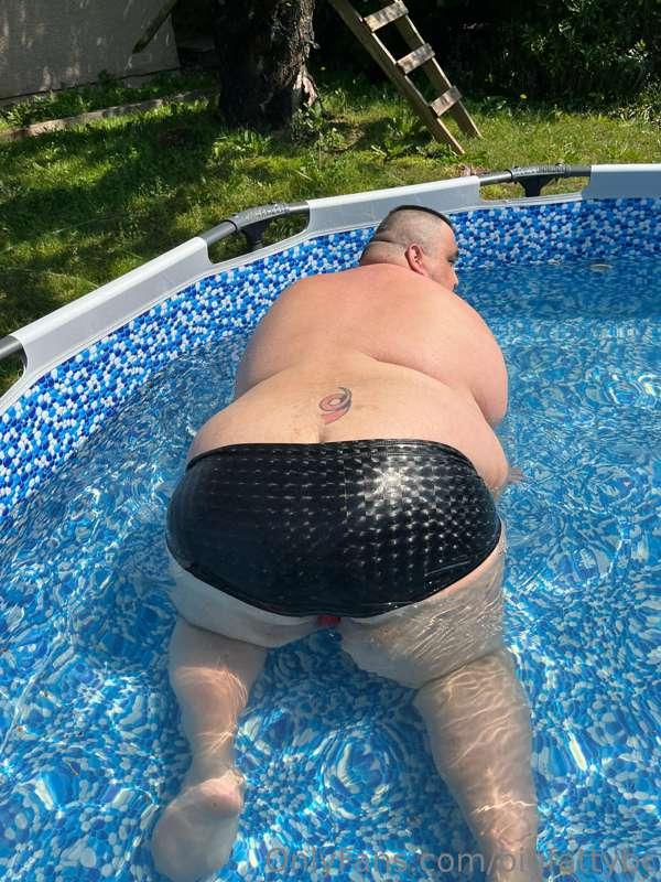 Look at my shiny Speedo. Hope it draws attention to my fat f..