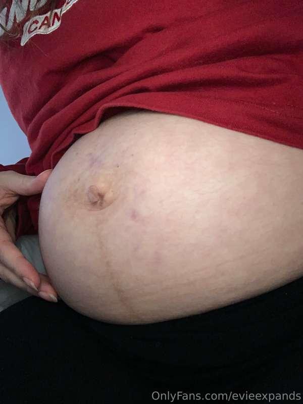 Little belly and popped belly button, still all round and bu..