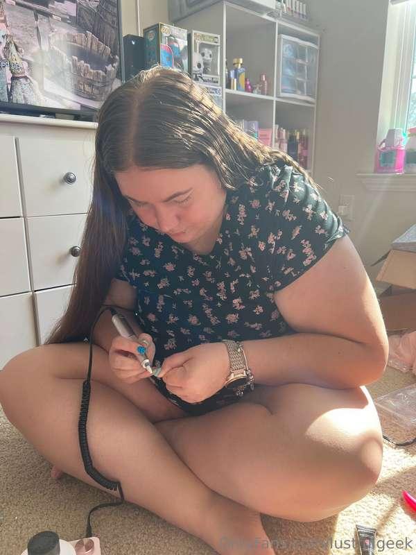 Just being a cute girl doing my own nails. Do you like my un..