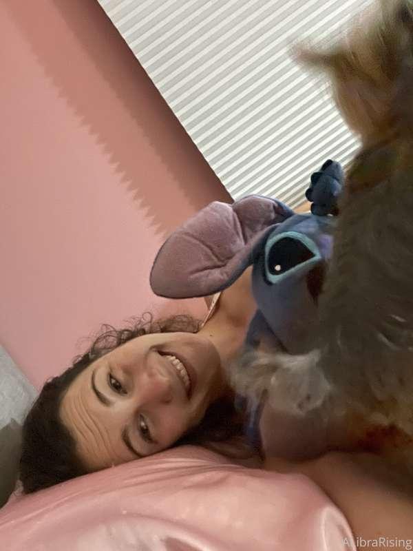 Me, Stitch, and the pup all cuddled up in bed 🛌