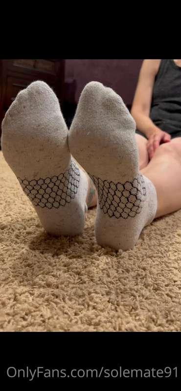 Taking my shoes and sweaty socks off after my run.  Want to ..