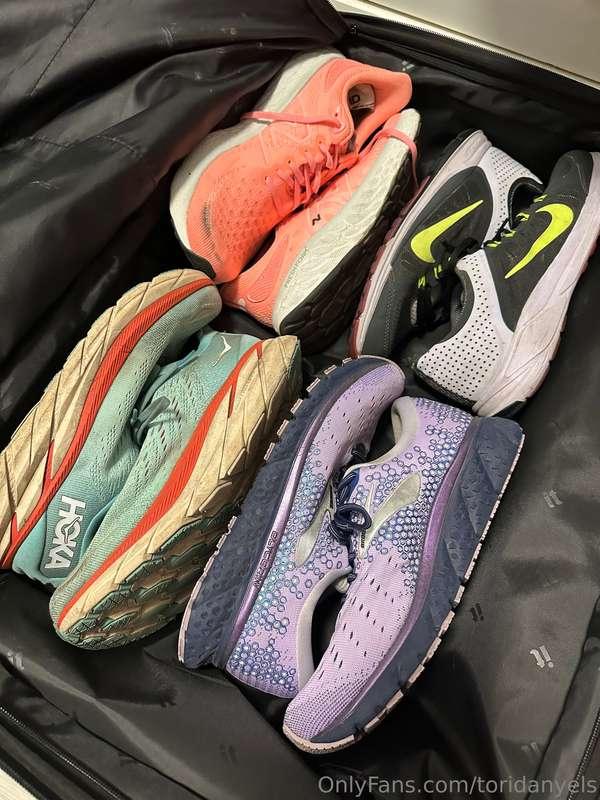Found an entire stash of old worn sneakers from marathons, h..