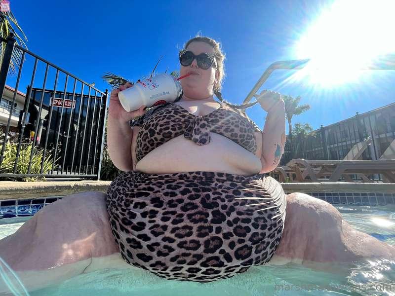 My idea of fun in the sun: drinking a big milkshake while lo..