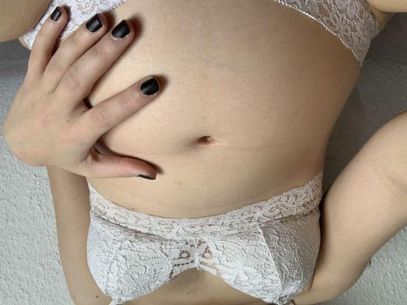 Bloated belly pictures in white lingerie
