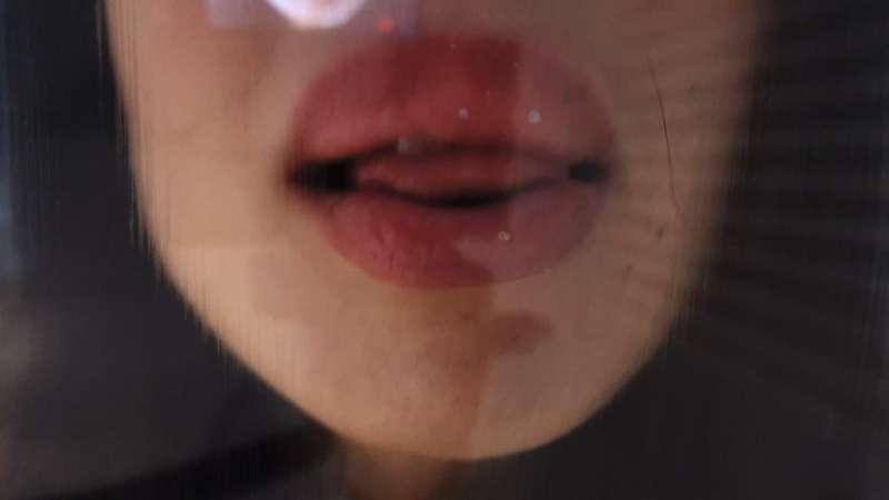 Glass kissing and licking under the shower