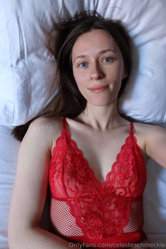 Red lingerie feels so much more luxurious against white shee..