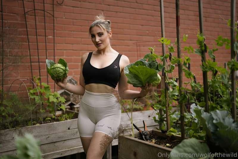 Harvesting greens, but I’m the real snack in the field 😏🥬