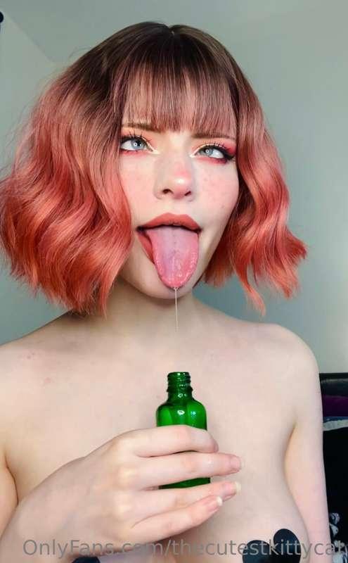 Filling up a bottle with my spit~ drooling all over the plac..