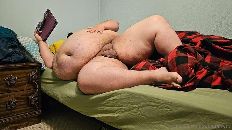 Relaxing in bed watching some porn