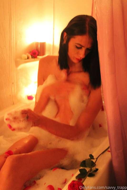Massaging my feet in this luxurious candlelight bath is so r..