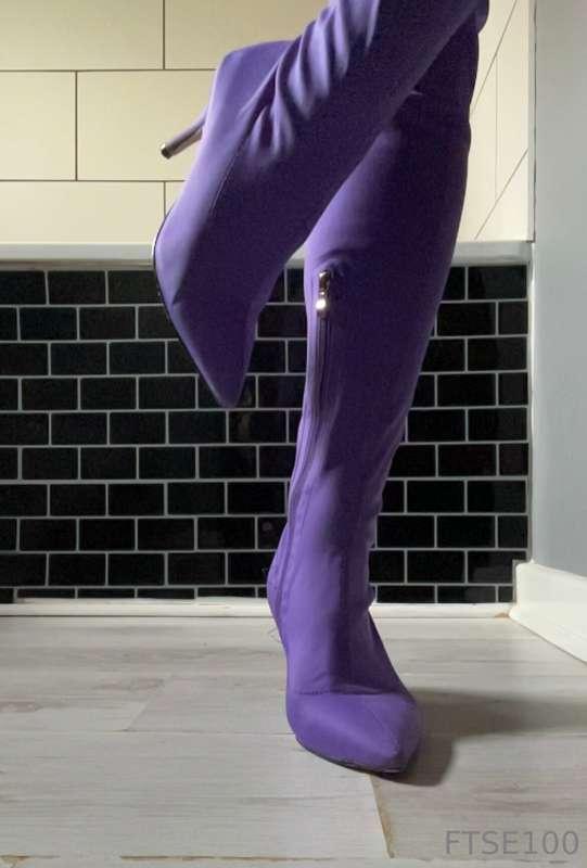 Your never fully dressed without a……. Purple Thigh High Boot..